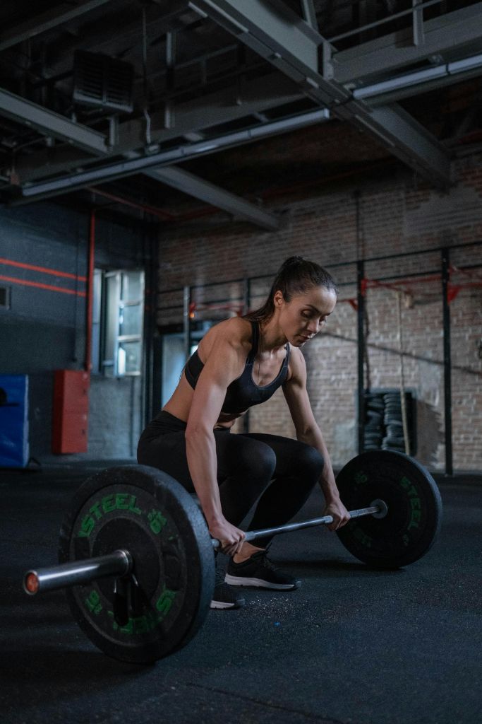 Woman performing deadlift